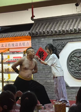 口吞铁球